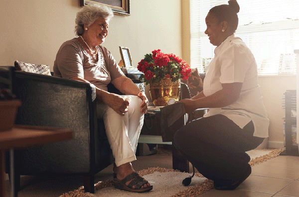Home care nurse with elderly  woman