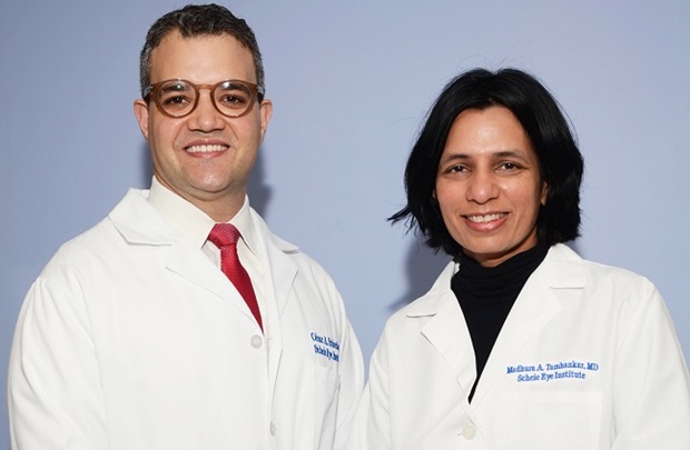 Dr. Cesar Briceno and Madhura Tamhankar smiling at the camera