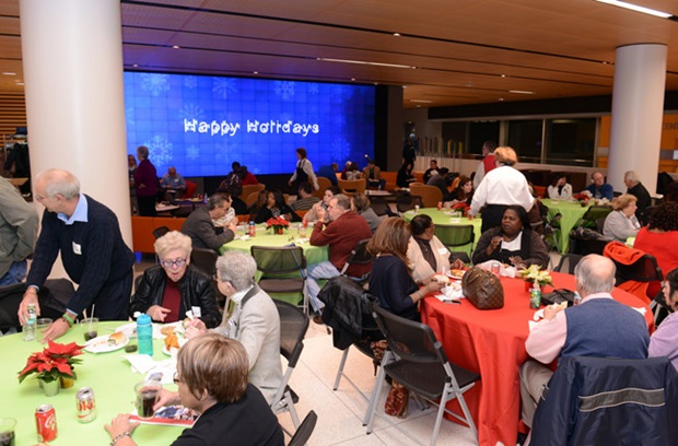 Tables of transplant recipients and loved ones attending the annual holiday or Christmas party