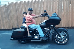 Patient James White on motorcycle