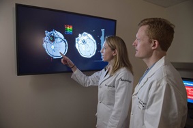 Dr. Davis and colleague review imaging