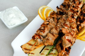 Grilled chicken souvlaki skewers with with tzatziki sauce
