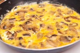 Sizzling eggs and mushrooms