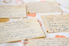 Scattered handwritten recipe cards
