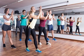 group of people in a dance class