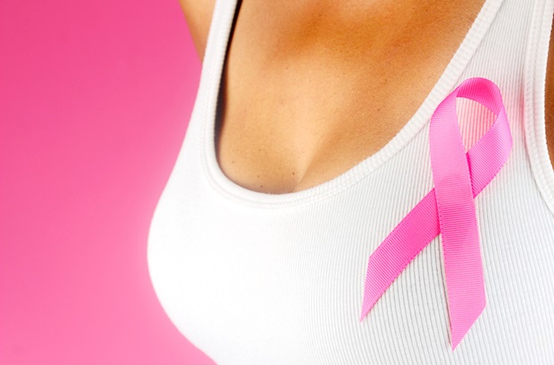 Woman wearing a pink ribbon