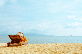 Woman lying on beach chair