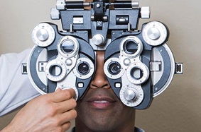 close-up of man getting an eye exam