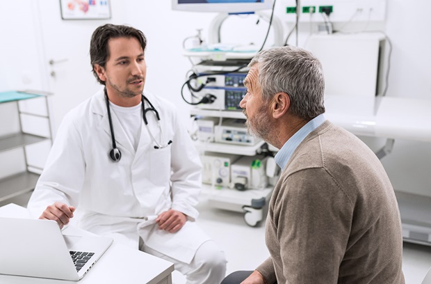 Doctor speaking with elderly patient
