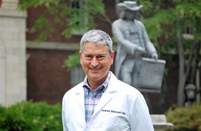 Dr. Andrew Siderowf smiling outdoors
