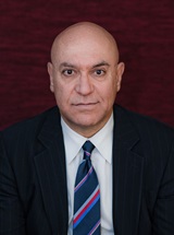 headshot of Mahmoud Ghusson, MD