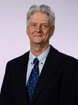 headshot of M. Clive Perry, MD