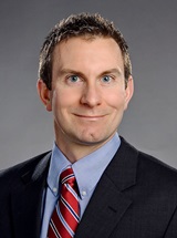 headshot of Michael J. Riggall, MD