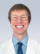 headshot of Thomas Riley, MD