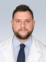 headshot of Evan Cory Rosenberg, MD, PhD