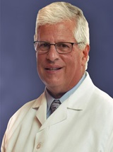 headshot of Stanley E. Rich, MD