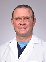 headshot of John E Vine, MD