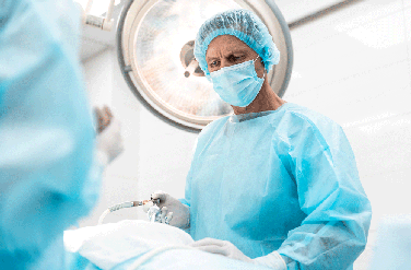 Male surgeon standing in operating room